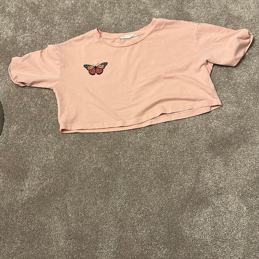 This shirt is so cute but there is small stain at the top of the shirt.